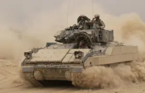 Hatches: An Army Bradley Fighting Vehicle kicks up ?