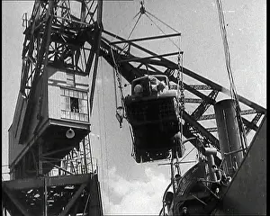 Dockside: Army Lorry In Mid Air Being Hoisted Onto a