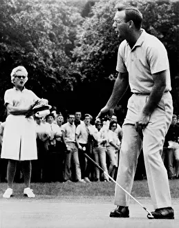 Reacting: Arnold Palmer, reacting to a missed put ?
