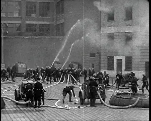 Tackle: ARP Wardens in Helmets Tackle A Fire Using