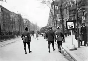 Casualties: Arrest of a protester by policemen, 1929