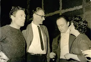 Supervise: Arthur Miller, American playwright, in Paris for film shoot