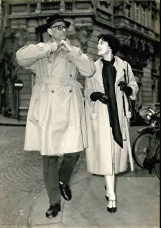 Resembles: Arthur Miller, American playwright, and wife Inge Morath