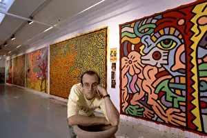 Haring: Artist Keith Haring standing in front of ?