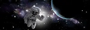 Unrecognizable: Artist's concept of an astronaut floating in outer space
