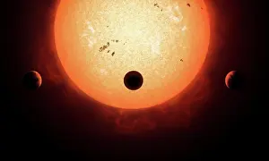 Sunspots: Artist's concept of an Earth-sized planet passing in front ?