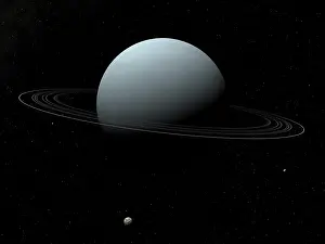 Satellites: Artist's concept of how Uranus and its tiny moon Puck