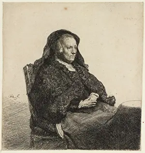 The artist's mother seated at a table