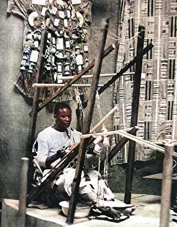 Weaves: An Ashanti weaving silk-cloth