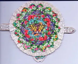 Tabs: Assorted flowers on a circular greetings card