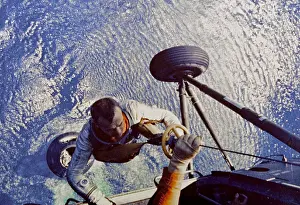 Splashdown: Astronaut Alan B. Shepard is hoisted aboard ?
