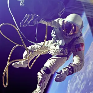 Maneuvering: Astronaut Edward White during his 23 minute ?