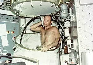 Skylab: Astronaut Jack R. Lousma, taking a hot bath ?