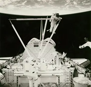 Astronauts: Astronauts during an EVA outside a Space Shuttle