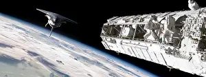Probe: Astronauts work on a space station while a space shuttle ?