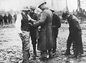 Compassion: Attending to wounded German prisoner, WW1