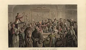 Frankreich: An auctioneer takes bids on the garter of the Blessed