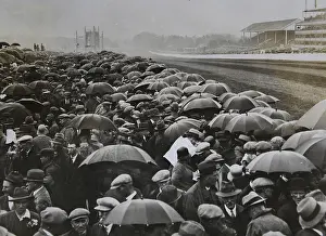 Racetracks: Audience in heavy rain at the races