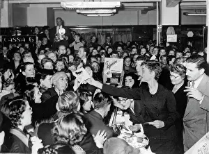 Maybe: Audrey Hepburn helps out in a shop, Amsterdam