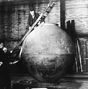 Pressurized: Auguste Piccard on a ladder examining the nacelle