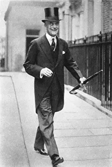 Striding: AUSTEN CHAMBERLAIN