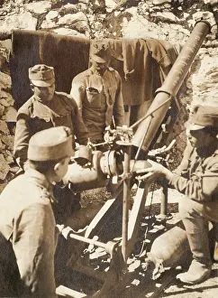 12cm: Austrian gunners loading 12cm trench mortar, WW1