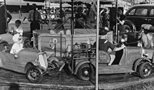 Donaldsonville: Automobile merry-go-round for the children, state fair, Dona
