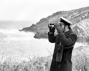 Coastguard: Auxiliary coastguard with binoculars, West Country