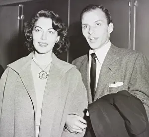 Lcgr2003: Ava Gardner and Frank Sinatra standing arm