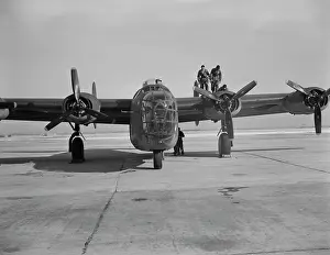 Inspecting: A B-24E Liberator bomber gets a last minute