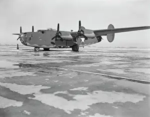 Bombers: A B-24E Liberator bomber on the tarmac at