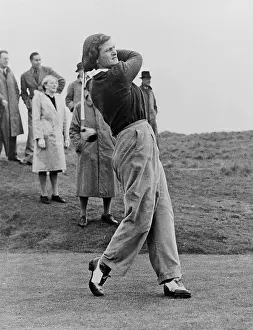 Gullane: Babe Didrikson, watching golf ball as she completes