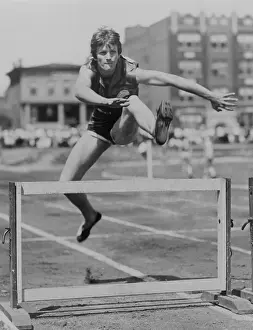 Lcgr1308: Babe Didrikson Zaharias clears hurdle at track