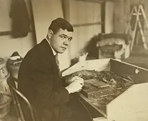 George Herman Babe: Babe Ruth rolling a Babe Ruth Cigar for his new