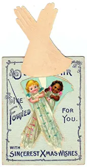 Puns: Two babies with comic greeting on a Christmas card