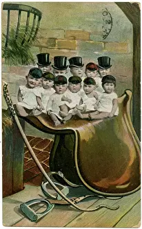 Stirrups: Babies in hats, sitting on a large saddle