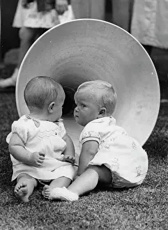 Fascinated: Babies in front a horn