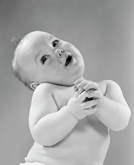 Diaper: Baby In Diaper Head To One Side