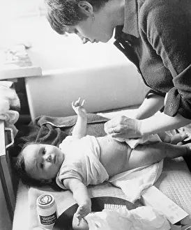 Nappy: BABY HAVING NAPPY CHANGE