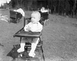 Highchair: BABY IN A HIGHCHAIR