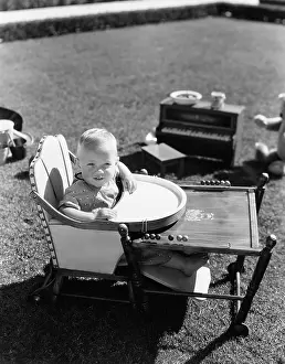 Highchair: Baby in highchair outside