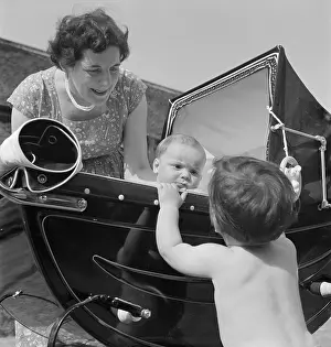 Munden: Baby In A Pram