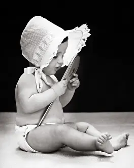 Realization: Baby Wearing Bonnet Looking into