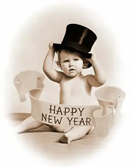 Head Ware: Baby wearing top hat surrounded by happy new