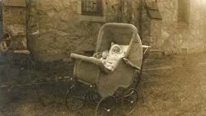 Cochran: Baby in a wickerwork pram, Delaware, USA