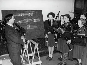 Blackboards: Bagpipe players