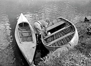 Bailing: Bailing out water from a boat