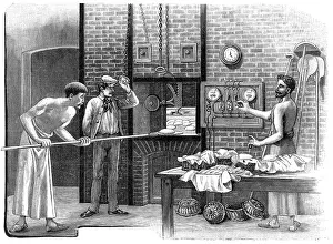 Electrically: BAKER INSERTING LOAVES