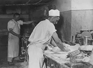 Dough: Baker kneads dough, 1929