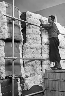 Stacks: Bales of raw wool at the Textile Fair Berlin, 1937